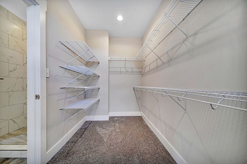 Walk-in closet with built-in shelving