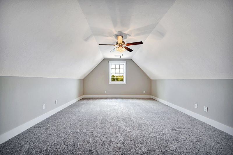 Bonus room with a vaulted ceiling