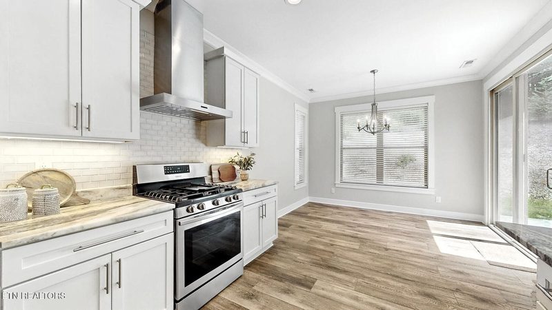 Kitchen range wall with subway tile backsplash