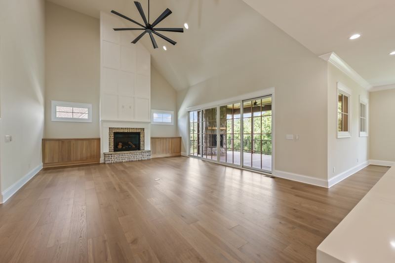 Great room with fireplace and wall of windows