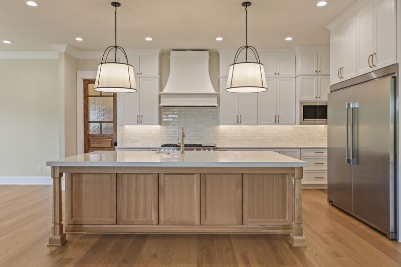 Kitchen with large center island and pendant lights