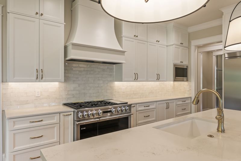 Range wall with custom hood