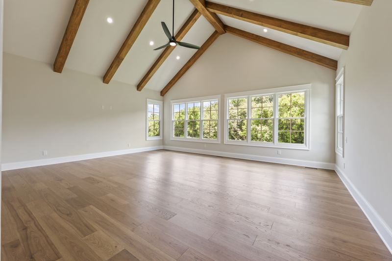 Vaulted room with exposed wood beams