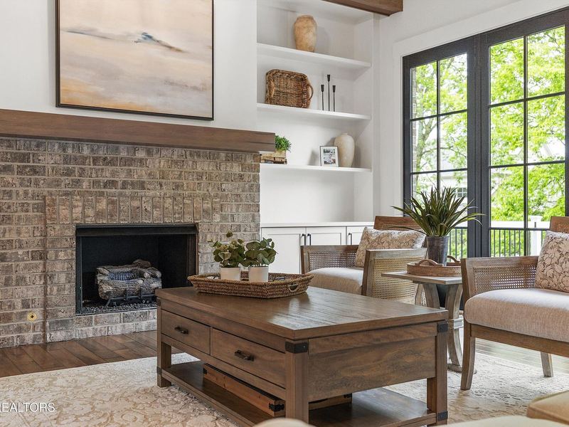 Living area with brick fireplace