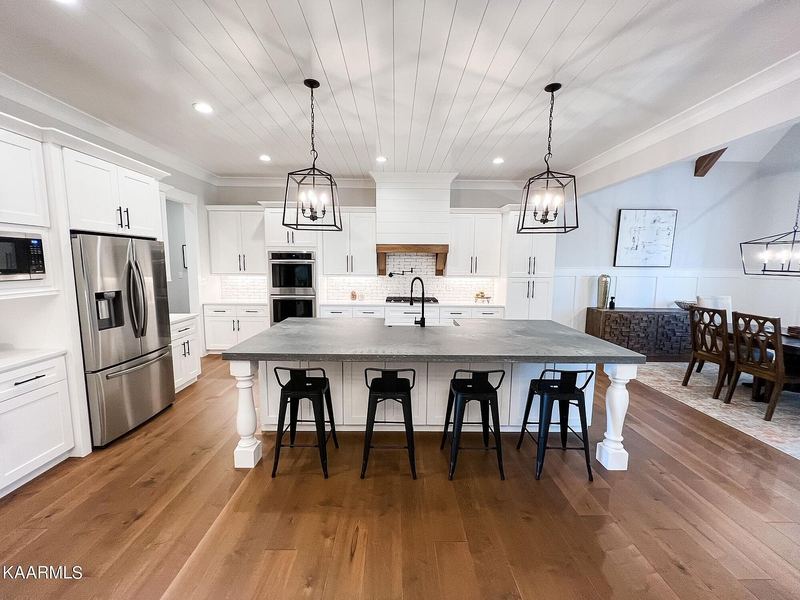 Kitchen with large island and bar seating