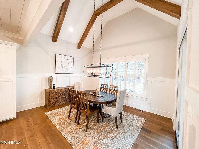Dining area with exposed beams