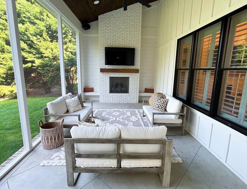 Covered porch with fireplace