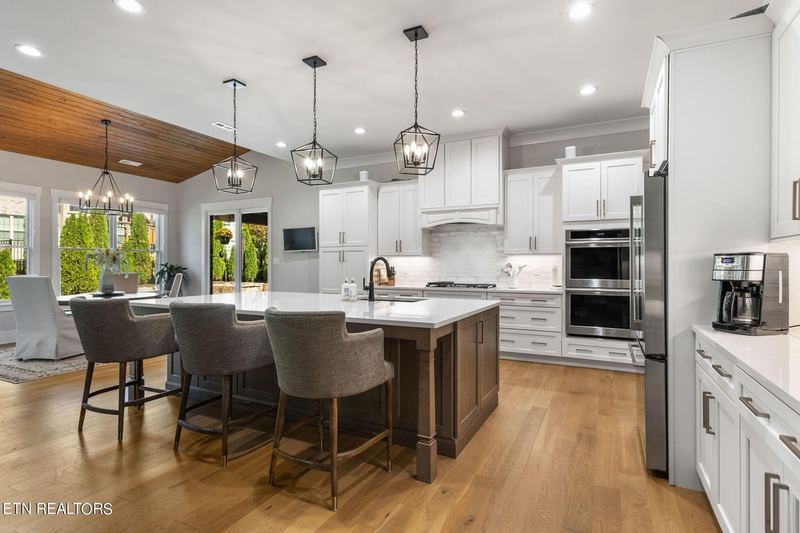 Kitchen with large island and pendant lights